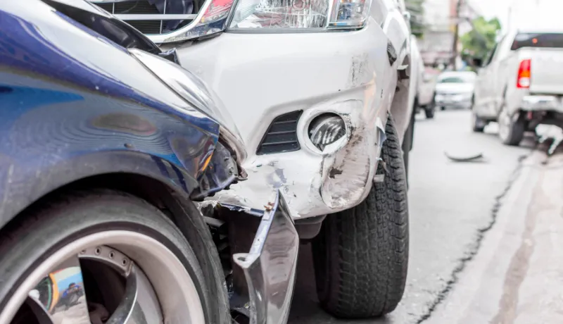 Car crash from car accident on the road in a city