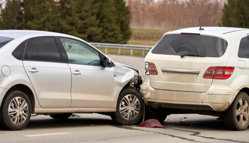 Road accident. Collision of two cars on the road. Selective focus.