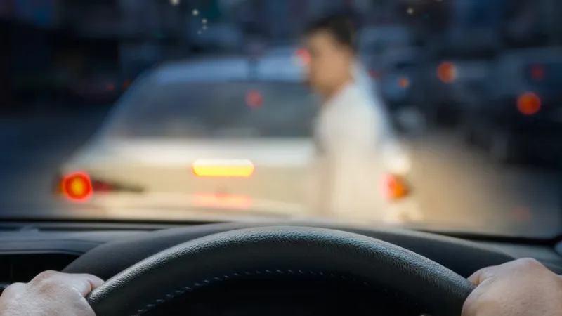 car emergency brake saved a life pedestrian runs across street.